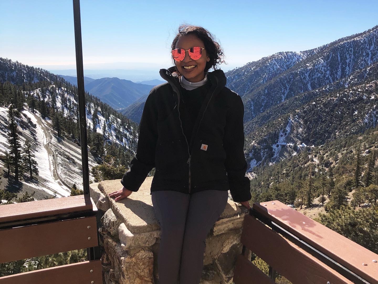 Mountain hiking photo with scenic valley view